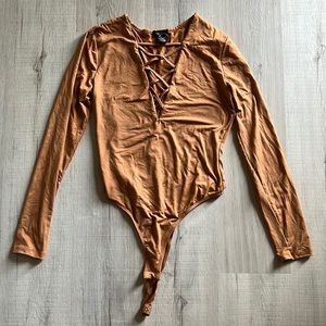 Rue 21 body suit with cris crossed chest